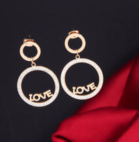 Tarohi JewelsStainless Steel Rosegold Plated Hoops with 'LOVE' written Earring-STNER 2704