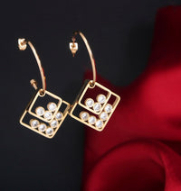 Tarohi JewelsStainless Steel Rosegold Plated Double Rhombus Shaped Hoops Earring- STNER 2760