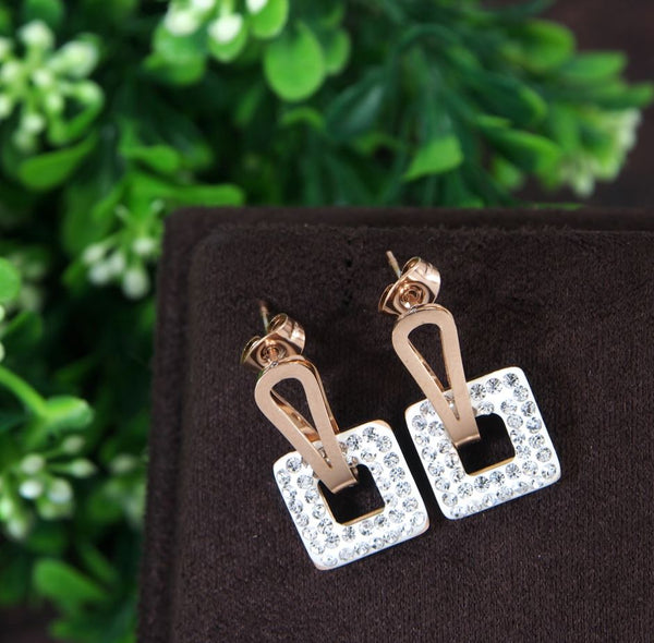 Tarohi JewelsStainless Steel Rosegold Plated Square Shaped White Coloured Earring-STNER 2767