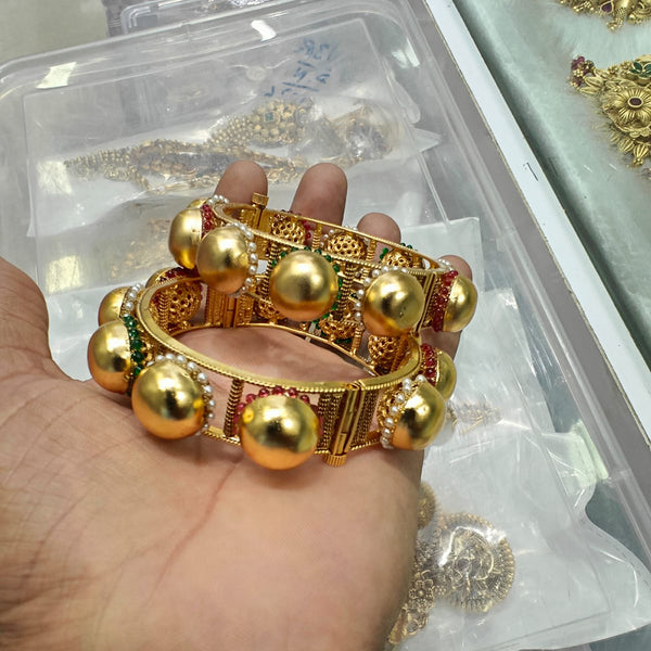 Balls bangles store gold designs