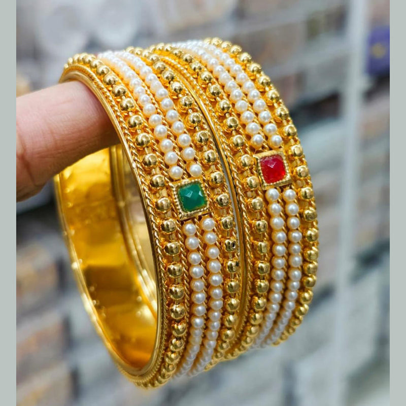 Pooja Bangles Gold Plated Pearl Bangles Set