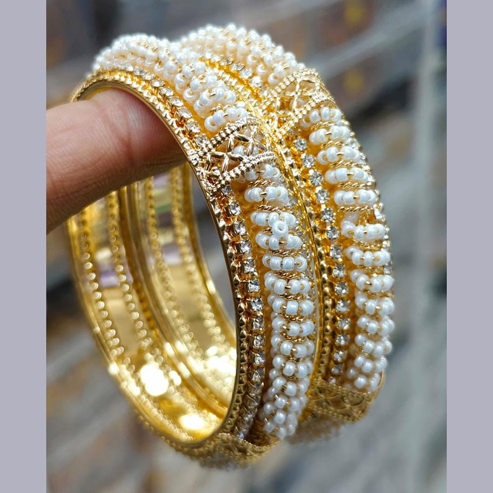 Pooja Bangles Gold Plated Austrian And Pearl Bangles Set