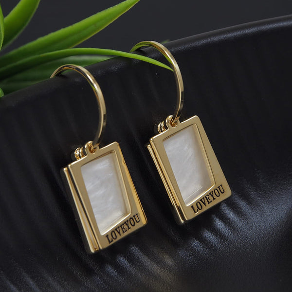 Tarohi Jewels Gold Plated Fancy Dangler Earrings