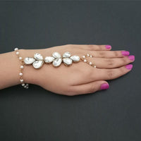 Apurva Pearls Gold Plated Glass Stone Chain Hand Harness - 1502437