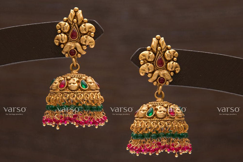 Emerald jhumkas in deals gold