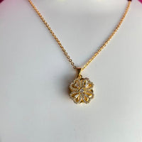Mahavir Ad Stone Gold Plated Floral Revolving Chain Pendant
