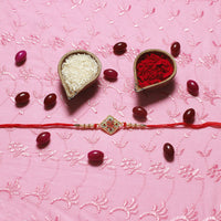 Kord Store Swastik Mark Mint Green And Ruby Minakari Thread Moti Gold Finish Rakhi Set Of 1 For Your Lovely Brother