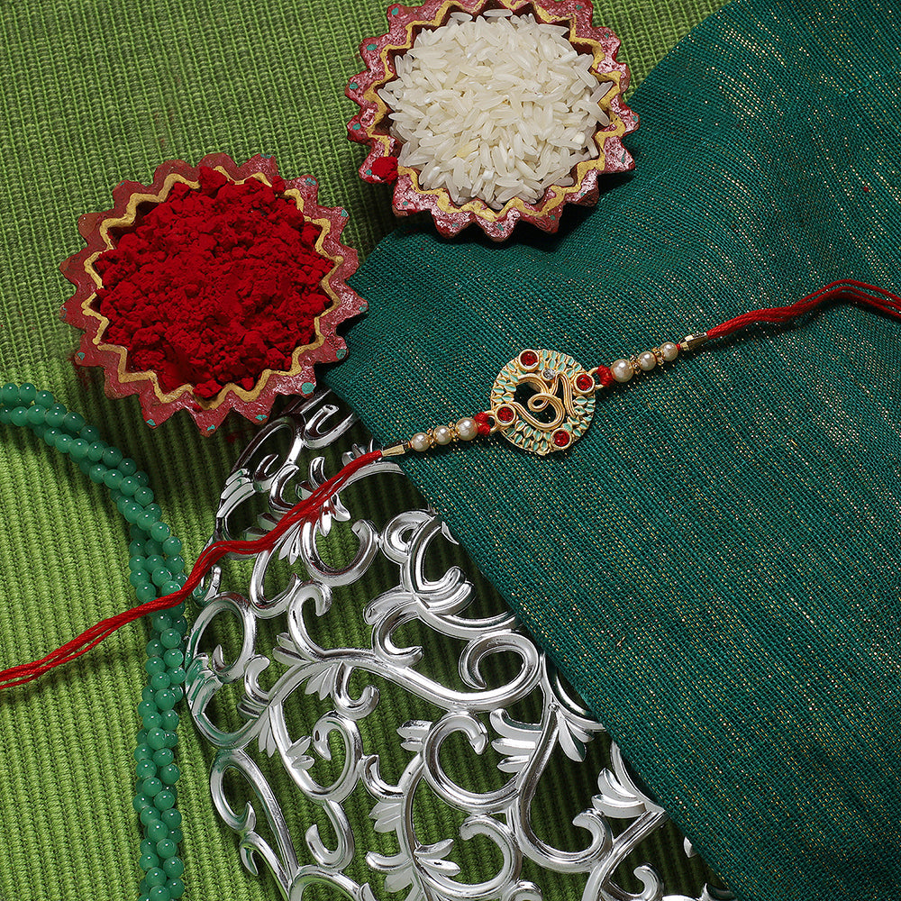 Kord Store 'Om' Design Mint Mina Ruby Stone Thread Moti Gold Finish Rakhi Set Of 1 For Brother