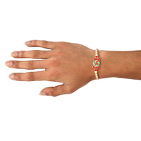 Kord Store 'Swastik' Mark Mint Green And Ruby Minakari Thread Moti Gold Finish Rakhi Set Of 1 For Brother