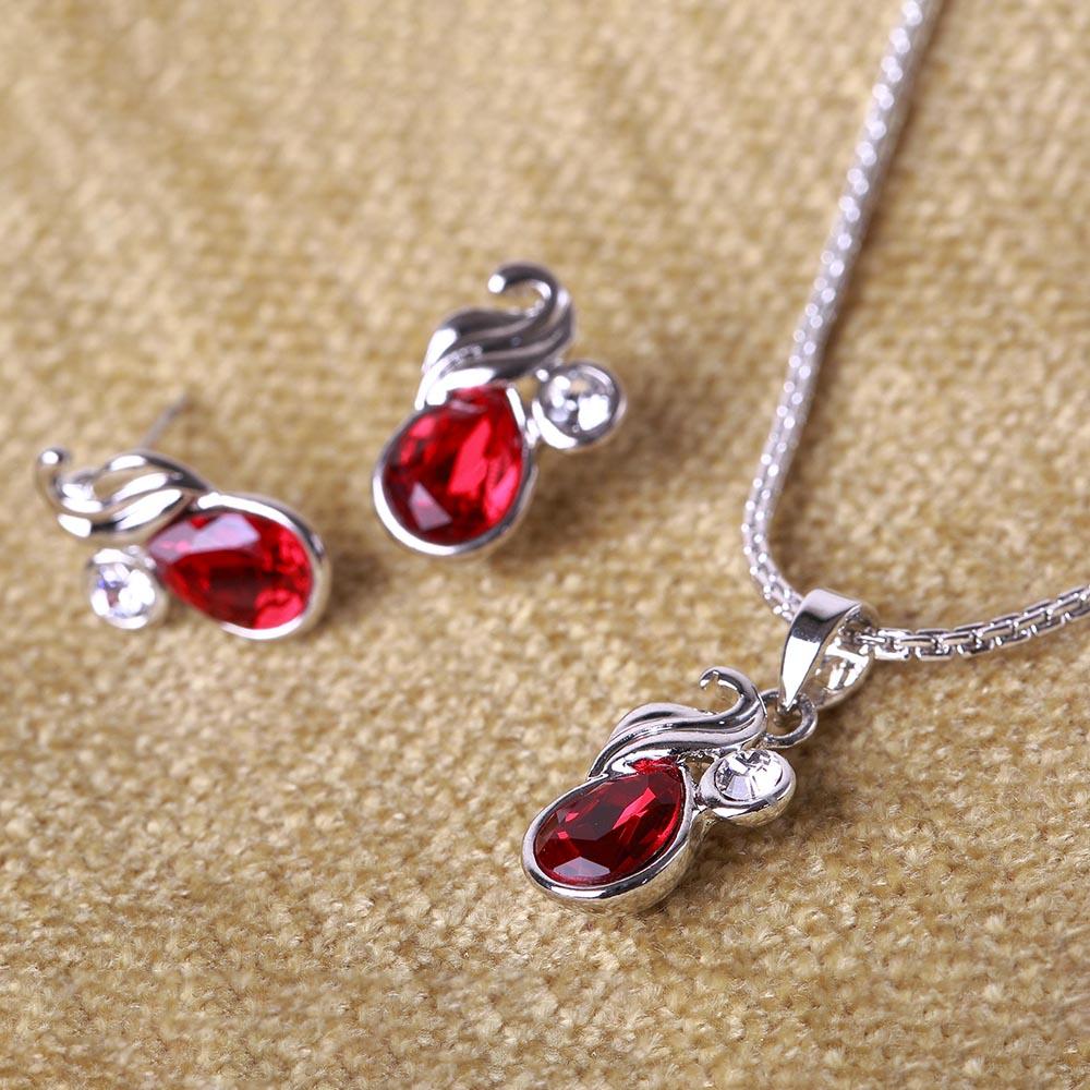 Mahi Rhodium Plated Red Marquise Peacock Pendant Set Made with Swarovski Crystal for Women