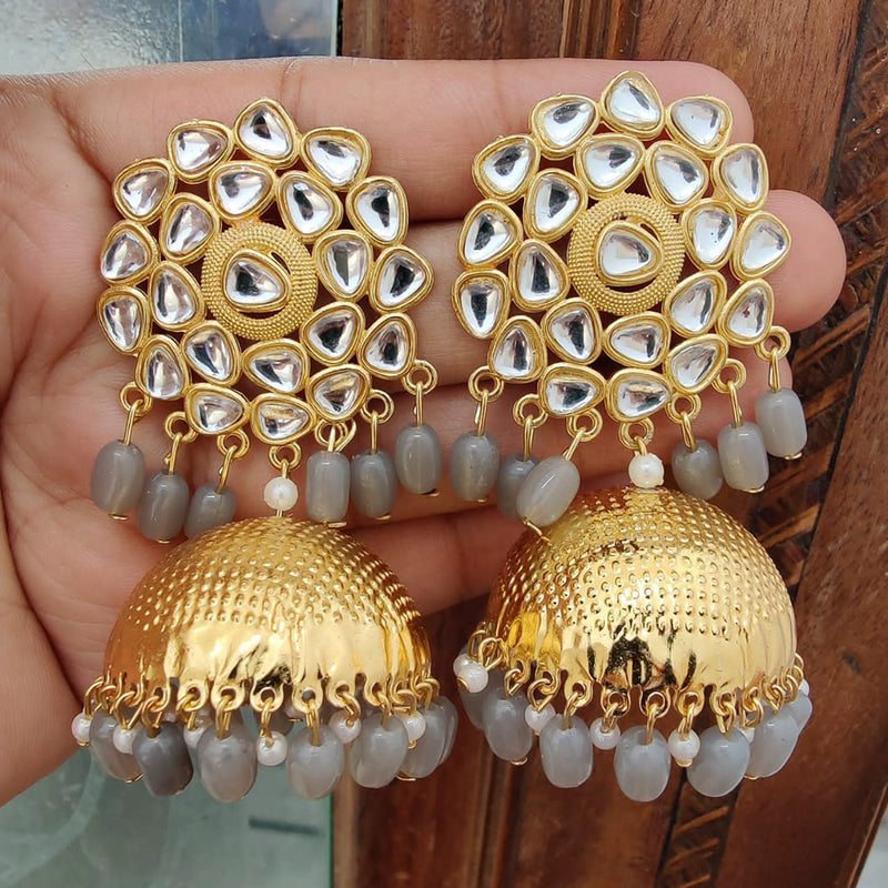 Vaamika Gold Plated Kundan Stone And Beads Jhumki Earrings